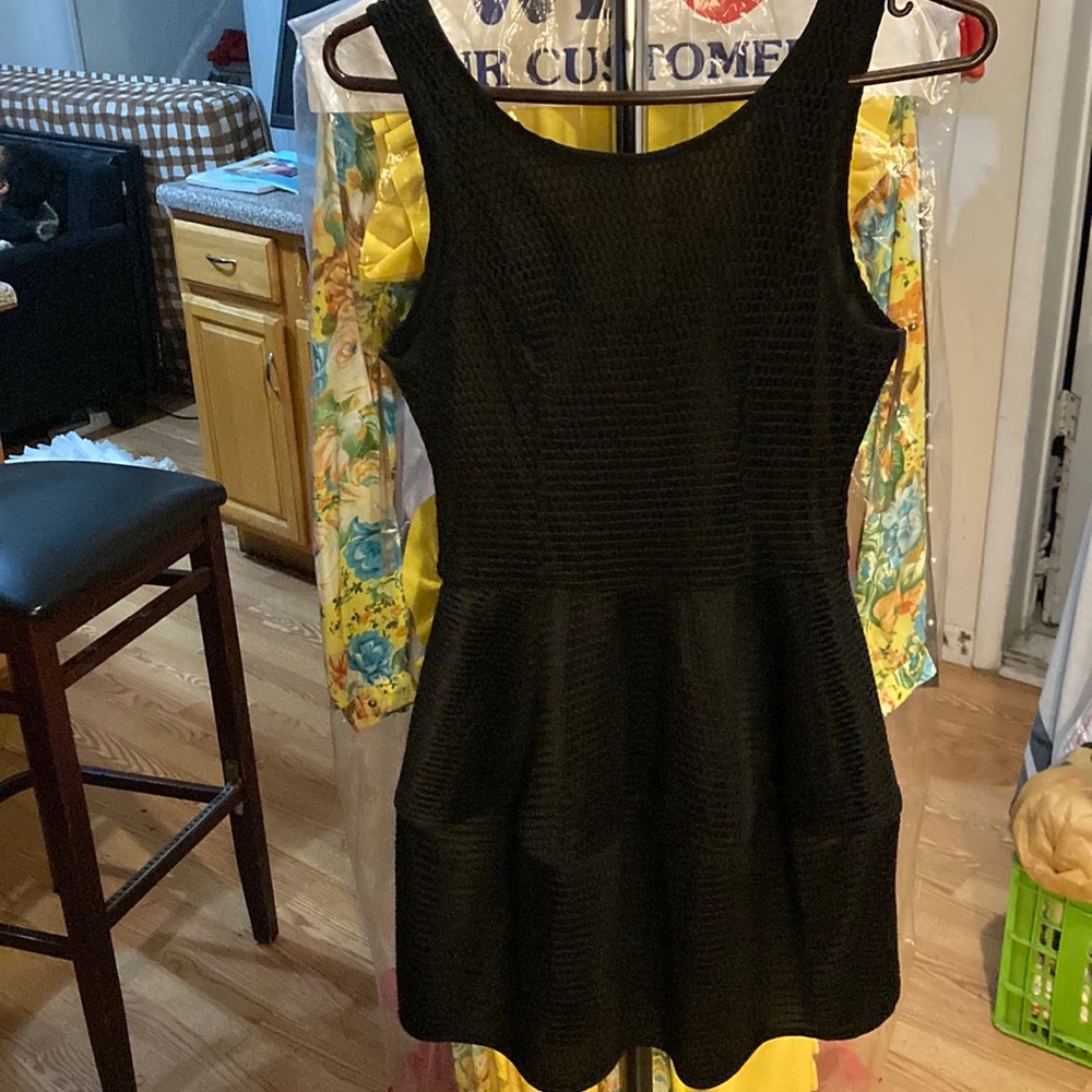 A Black dress made by Hot Nd Delicious